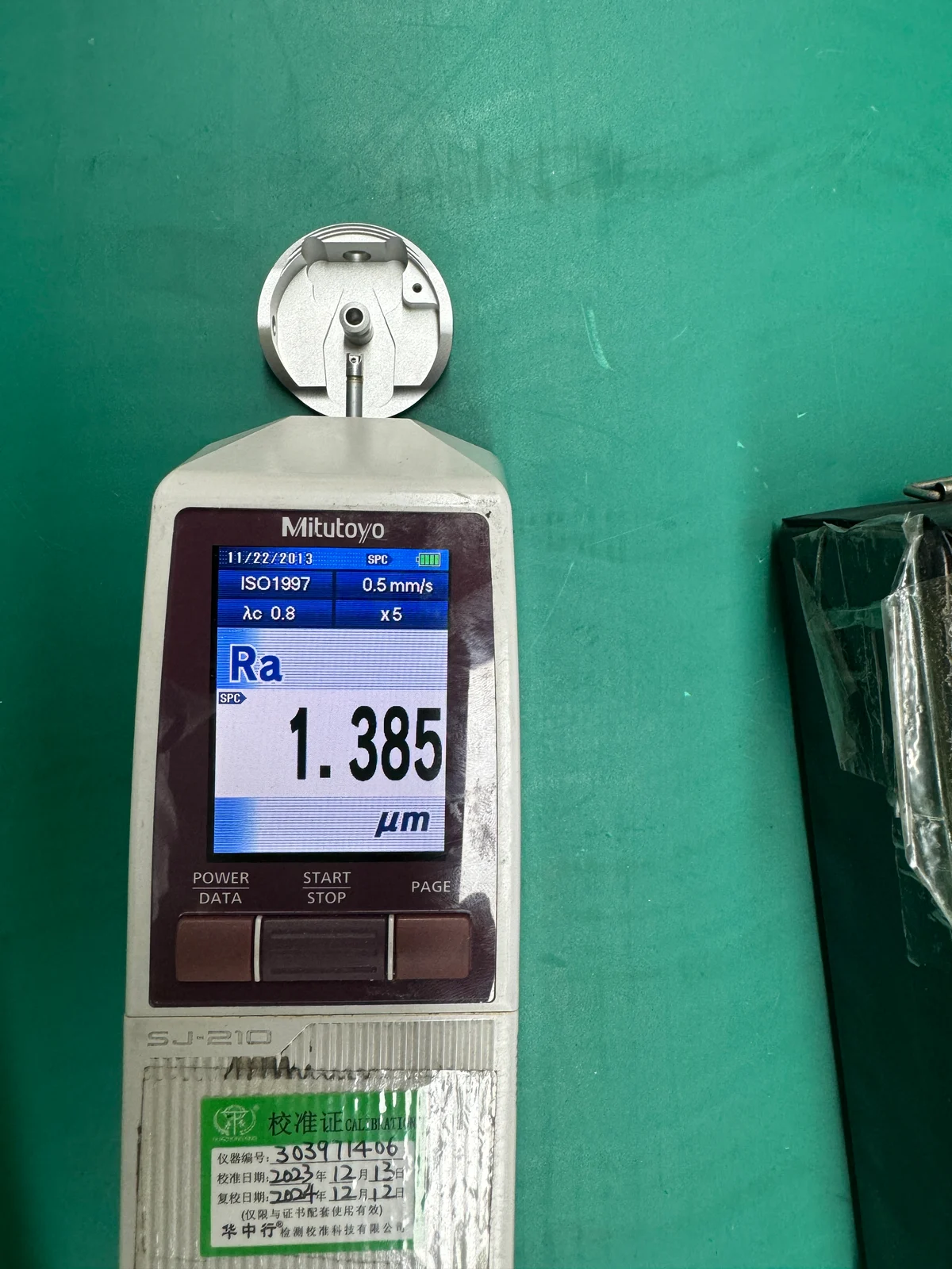 Mitutoyo SJ-210 displaying Ra 1.385 micrometers on the specified face of a finished 6082 component after blasting and anodizing