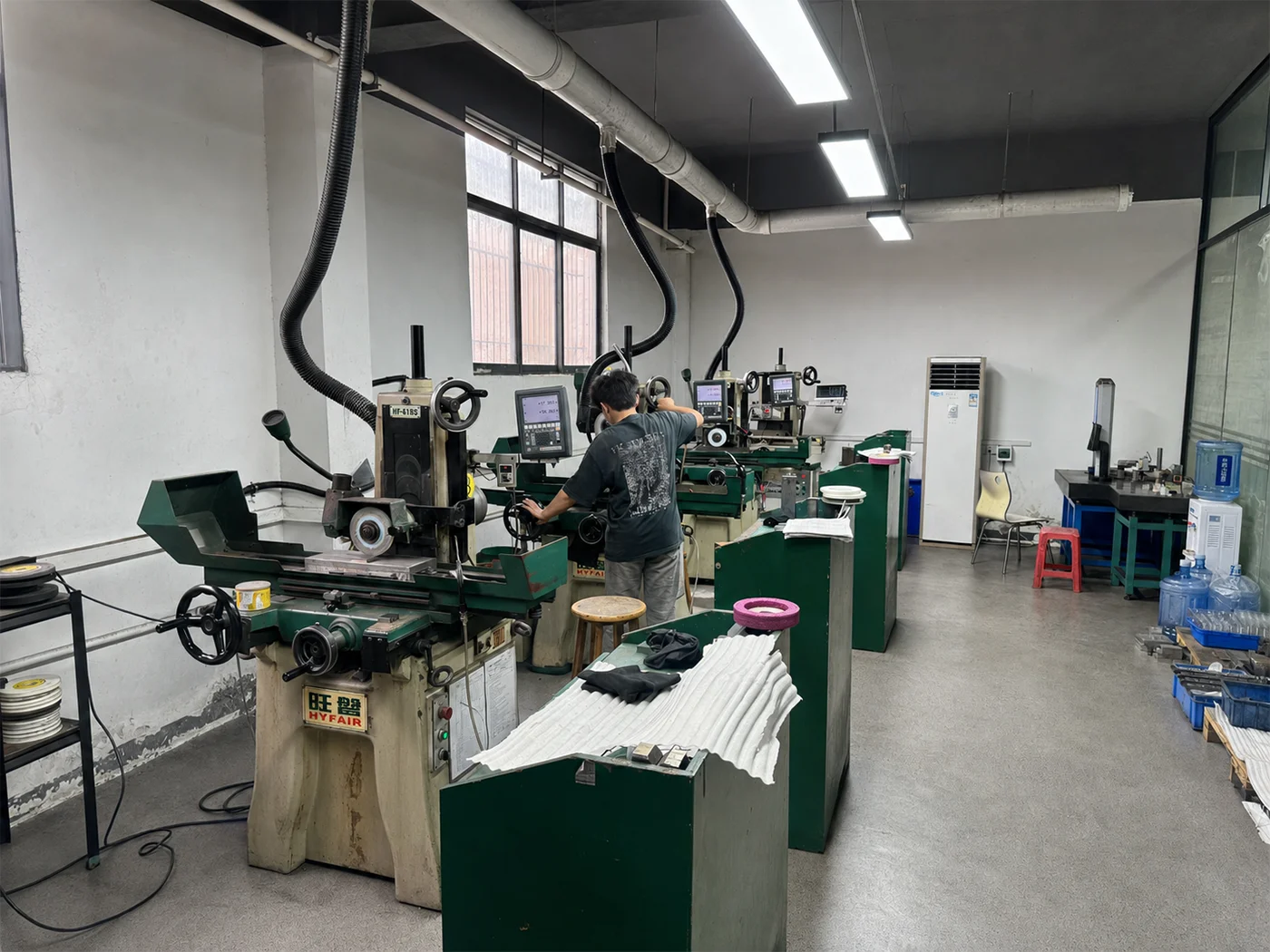 Precision grinding operation finishing a critical metal surface