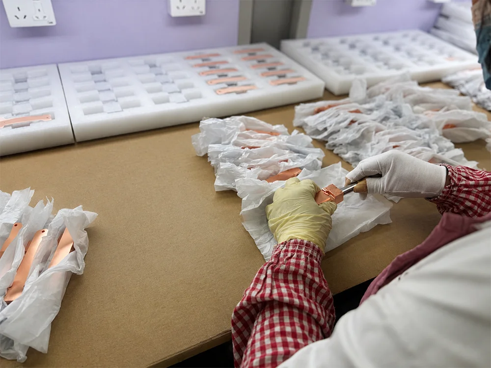 Finished precision parts inspection and packing preparation for overseas delivery